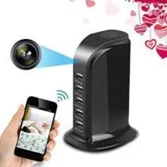 Smart home security setup: a camera lens beams toward a black hub while a smartphone shows a map and a wireless connection symbol.