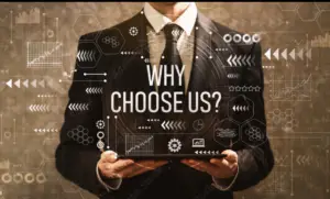 Businessman in a suit holding a tablet with 'Why Choose Us?' and surrounding futuristic data graphics.
